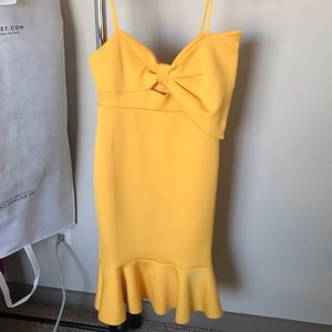 Large bow detail cocktail dress.
